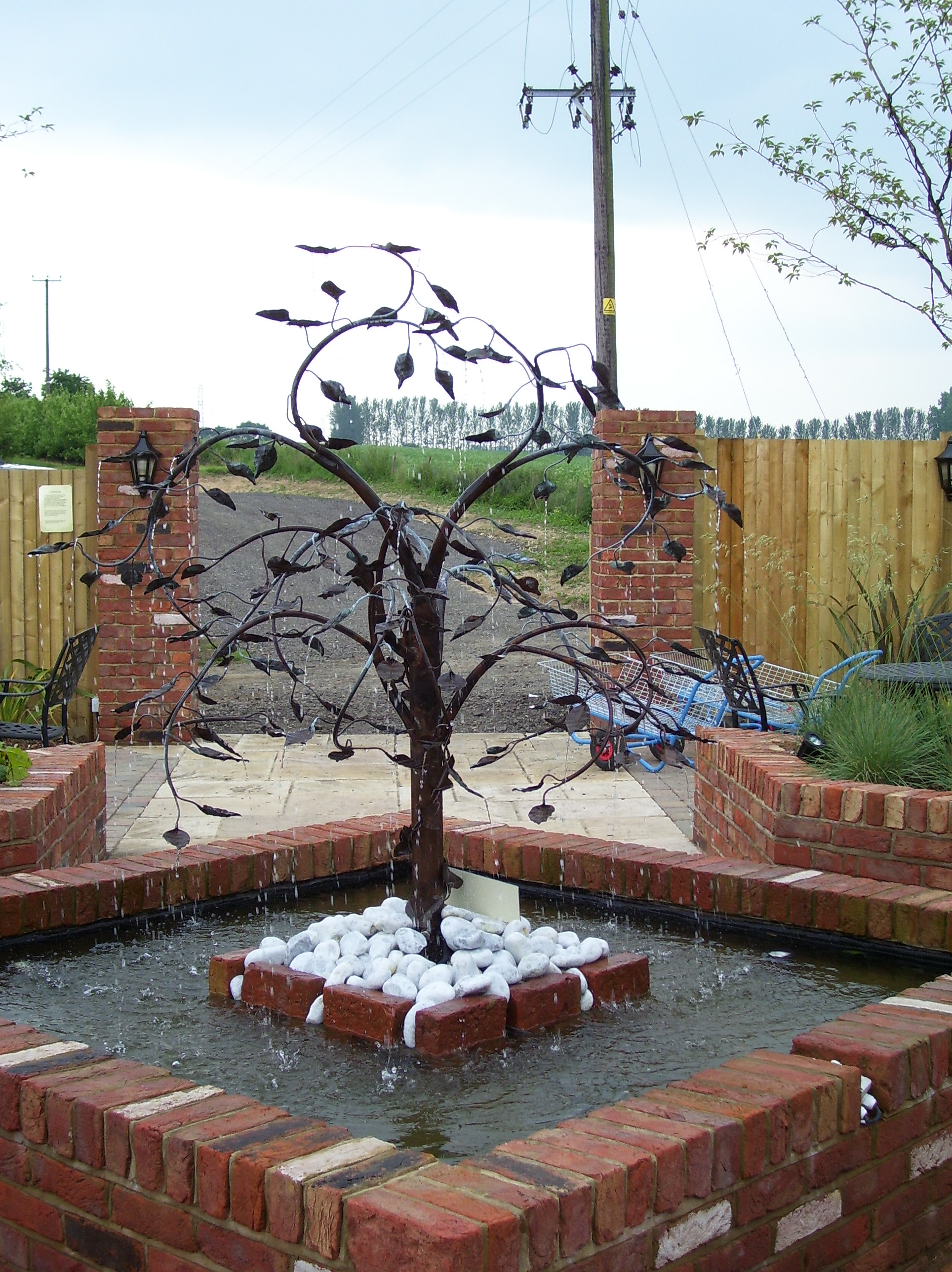 The Copper Sculptor Specializing in Copper Tree Water Features